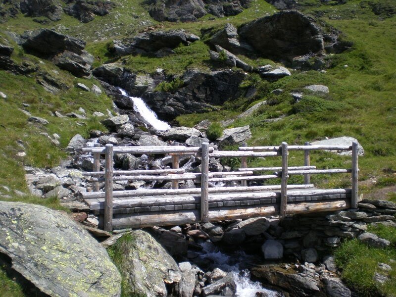 Clear water streams run along the pastures